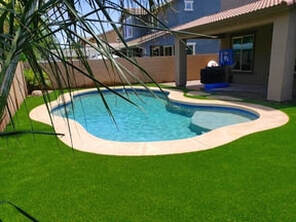 beautiful poolside artificial grass installation photo